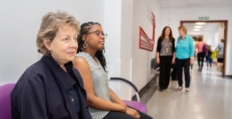 People waiting in a hospital corridor 