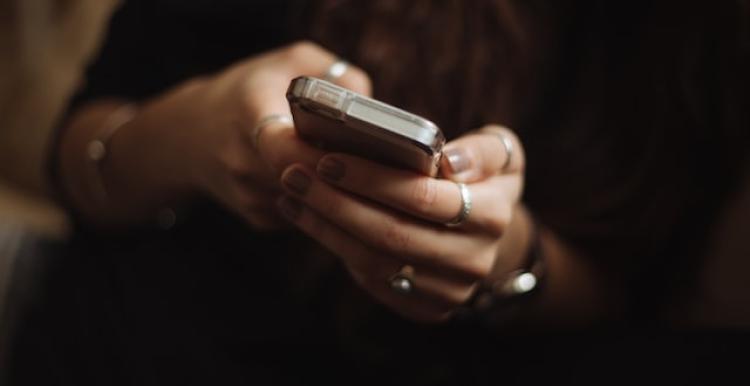 Hands holding a mobile smartphone