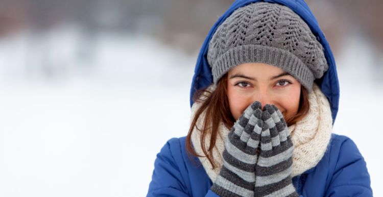 lady wearing winter clothes outside in the cold