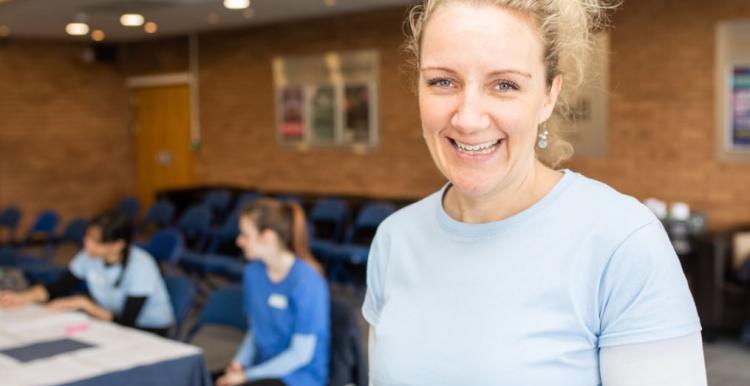 Smiling lady facing camera