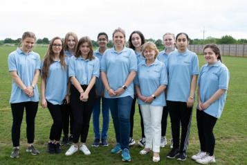 Group of Healthwatch youth volunteers on playing field