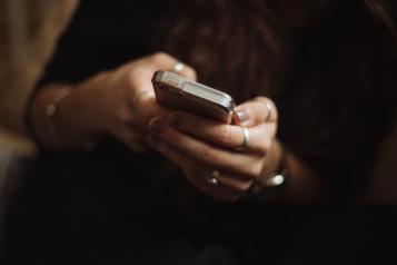 Hands holding a mobile smartphone