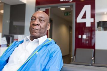 Older gent in hospital waiting area